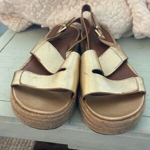 Naturizer Brand gold sandals. Size 7 slight playform